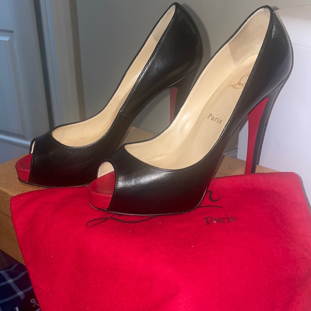 Christian Louboutin’s women’s shoe, 100% authentic Neiman Marcus size 8.5 /38.5